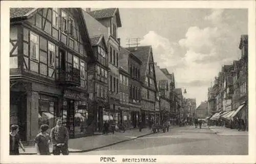 Ak Peine in Niedersachsen, Stadtansicht, Breitstraße,  Architektur, Wolken am Himmel