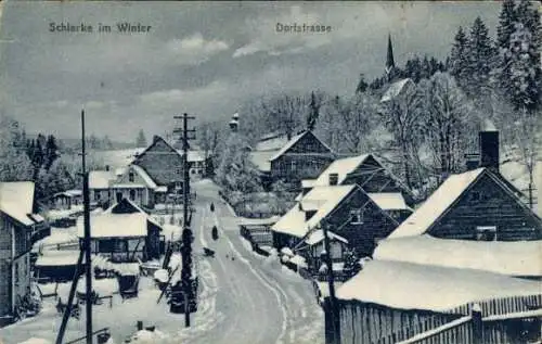 Ak Schierke Wernigerode im Harz, Schneebedeckte Dorfstraße, Winterlandschaft, Häuser im Schnee, K