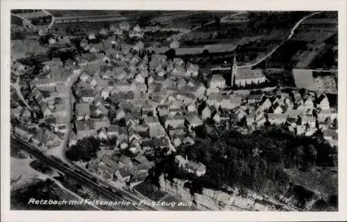 Ak Retzbach Zellingen am Main Unterfranken, Luftaufnahme von  Felsenpartie, Häuser, Kirche