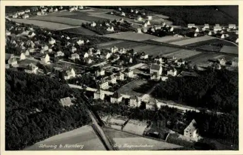 Ak Schwaig bei Nürnberg Mittelfranken, Luftaufnahme von Schwaig, viele Häuser, Felder, Wald,  Ans