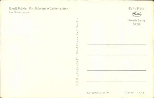 Ak Groß Köris, Partie am Schützen See, Steg, Ruderboot, Kirchturm