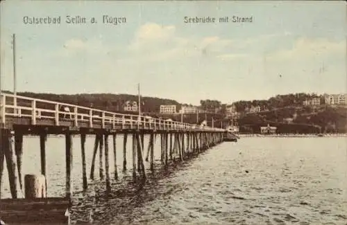 Ak Ostseebad Sellin auf Rügen, Seebrücke mit Strand, Ostseebad Sellin, Rügen