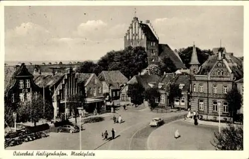 Ak Ostseebad Heiligenhafen in Holstein, Ostseebad  Stadtansicht, Markt, Gebäude, Straßenansicht