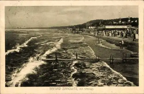 Ak Ostseebad Zinnowitz auf Usedom, Seebad  Strandansicht, Wellen, Gebäude im Hintergrund