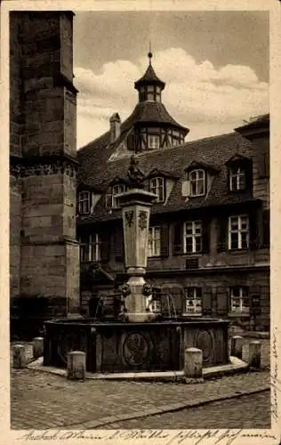 Ak Ansbach in Mittelfranken Bayern, Brunnen, historische Architektur, Gebäudeteil links, Dach ...
