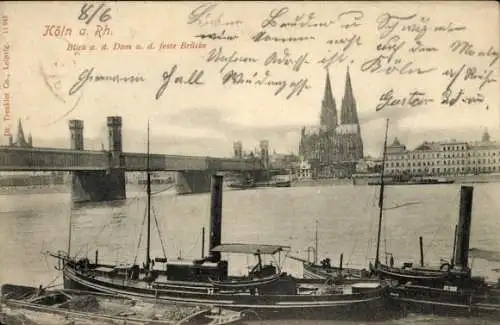 Ak Köln am Rhein, Blick auf den Dom, die feste Brücke, Schiffe im Vordergrund