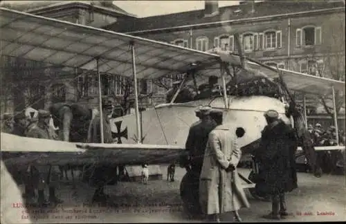 CPA Exposition Place Léopold, d'un aeroplane allemand qui, après avoir bombardé Lunéville