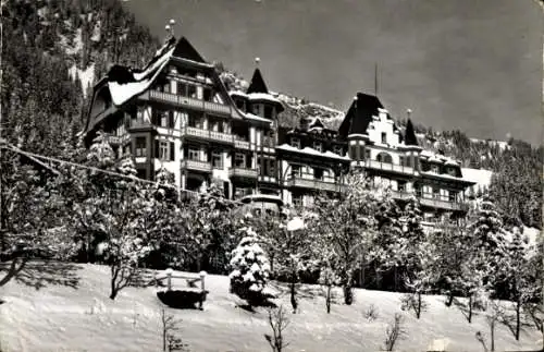 Ak Adelboden Kanton Bern Schweiz, Hotel National  schneebedeckte Bäume, Berglandschaft