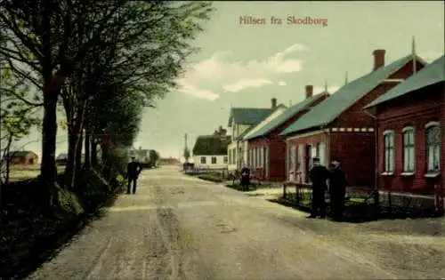 Ak Skodborg Schottburg Dänemark, Straße, Häuser, Bäume, Personen, 