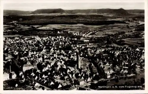 Ak Nürtingen am Neckar Württemberg, Luftaufnahme von  viele Häuser, Landschaft im Hintergrund
