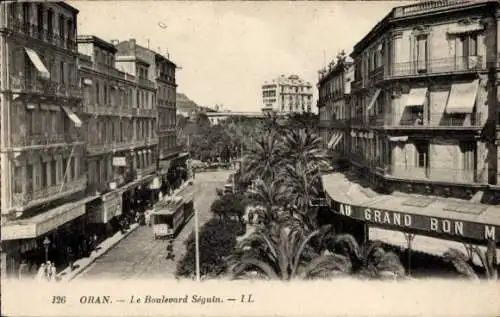 Ak Oran Algerien, Boulevard Séguin, Tram, Palmen, Architektur