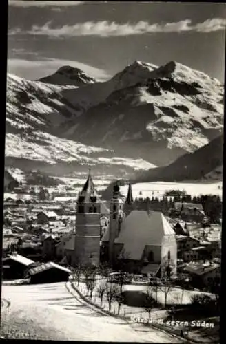 Ak Kitzbühel in Tirol, Berglandschaft, schneebedeckte Berge, Kirche, Kitzbühel