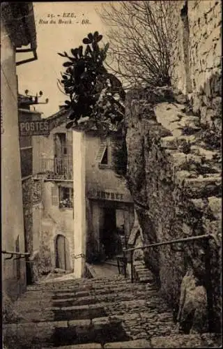 Ak Èze Alpes Maritimes, Gasse in  Steine, Pflanzen, Wegweiser, alte Architektur