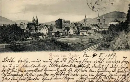Ak Goslar am Harz, Panoramablick auf  Berge im Hintergrund,  Gebäude