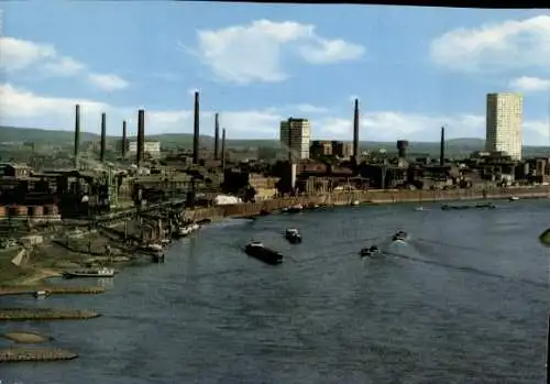 Ak Wiesdorf Leverkusen am Rhein, Stadtansicht mit Industrieanlagen, Rhein, Schiffe, Wolken