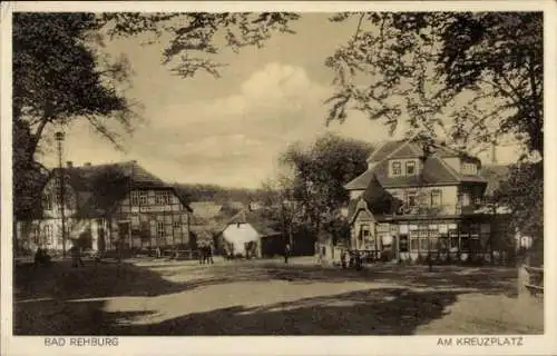 Ak Bad Rehburg Niedersachsen,  Am Kreuzplatz,  Gebäude, Bäume, Menschen