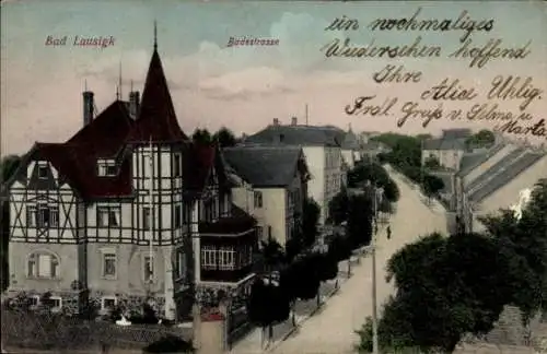 Ak Bad Lausigk Bad Lausick in Sachsen,  Badestrasse, verziert mit Fachwerk, s Gebäude