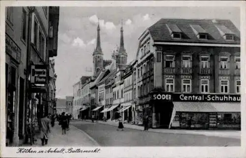 Ak Köthen in Anhalt, Straße mit Gebäuden, Drogerie, Central-Schuhhau, Zwillingstürme