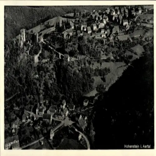 Ak Hohenstein im Taunus, Luftaufnahme der Burg Hohenstein, umliegende Häuser, Waldgebiete