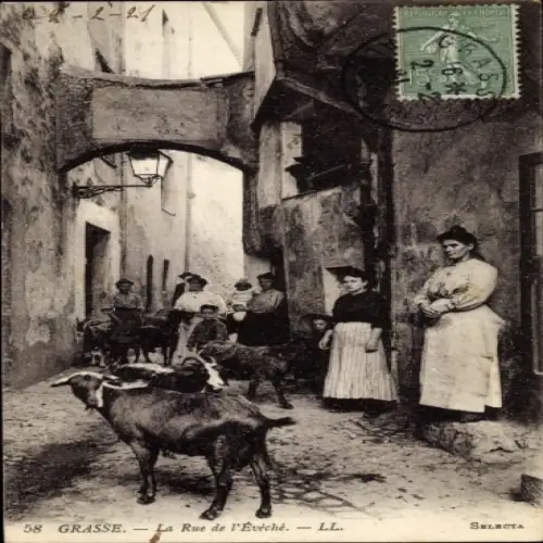 Ak Grasse Alpes Maritimes, Gasse mit Ziegen,  Architektur, Personen in Trachten
