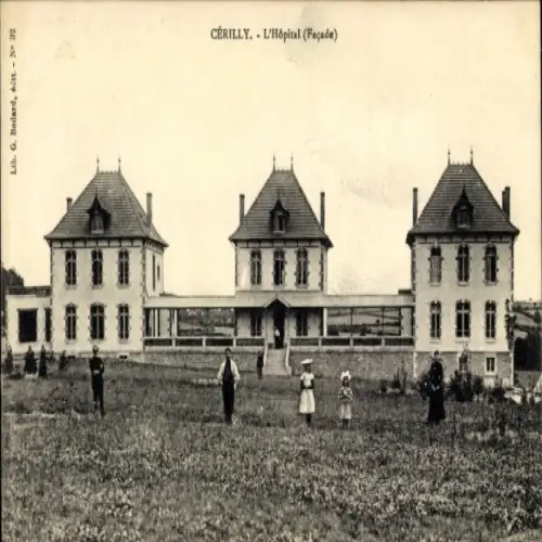 Ak Cérilly Allier, L'Hôpital,  Gebäude, drei Türme, Wiese, Personen