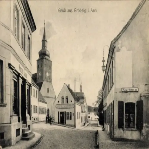 Ak Gröbzig in Anhalt, Straßenpartie, Geschäfte, Kirche