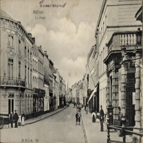 Ak Mechelen Mecheln Malines Flandern Antwerpen, Straße in  Gebäude, Flaggen,  