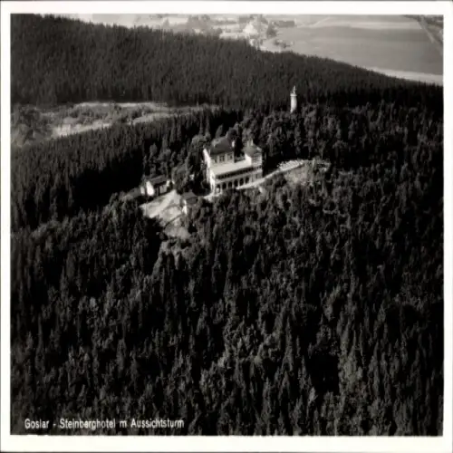 Ak Steinberg Goslar am Harz, Steinberghotel, Aussichtsturm, Waldlandschaft, Luftaufnahme