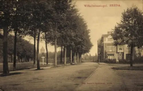 Ak Breda Nordbrabant Niederlande, zeigt eine Straßenszene mit Bäumen,  einem Gebäude und einem...