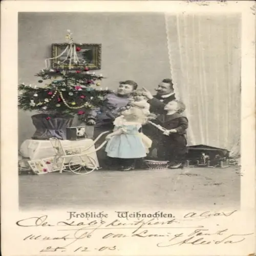 Ak Fröhliche Weihnachten, Familie am Tannenbaum