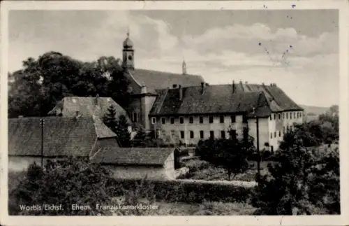 Ak Worbis im Eichsfeld Thüringen, Ehem. Franziskanerkloster, Häuser, Bäume, Himmel