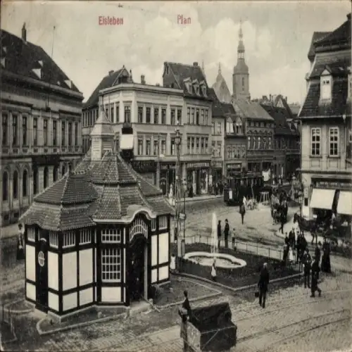 Ak Lutherstadt Eisleben, Marktplatz, Brunnen, r Bau, Stadtansicht, Wolken