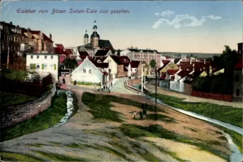 Ak Lutherstadt Eisleben, Blick auf  böse Sieben-Tale, Häuser und Kirche