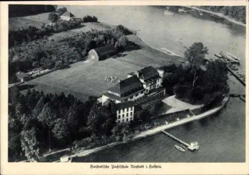 Ak Neustadt in Holstein, Luftaufnahme, Hanseatische Nachtschule, dichter Wald, Wasser