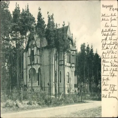Ak Burgwedel in Niedersachsen, Vorderansicht eines Hauses, umgeben von Bäumen, nformat