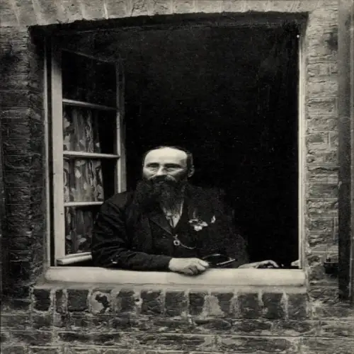 Ak Repelen Moers am Niederrhein, Pastor Felke, Portrait am Fenster