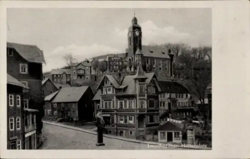 Ak Lauscha in Thüringen , Hüttenplatz, Stadtansicht, alte Häuser, Uhrturm
