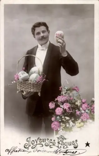 Ak Glückwunsch Ostern, Mann mit Korb, Ostereier, Blumen