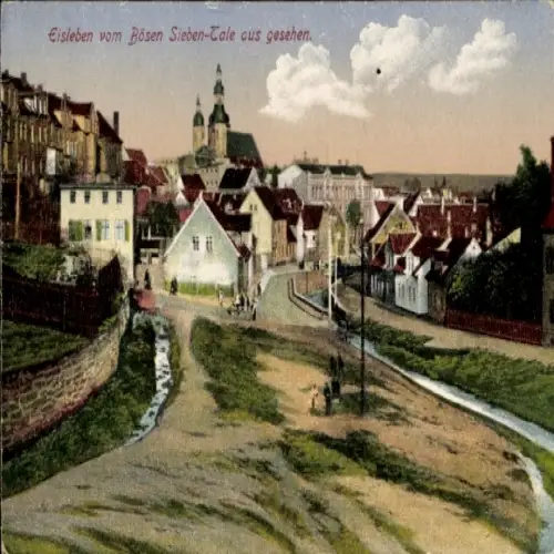 Ak Lutherstadt Eisleben,  Straßenansicht, Kirche, Häuser, Fluss, Bäume