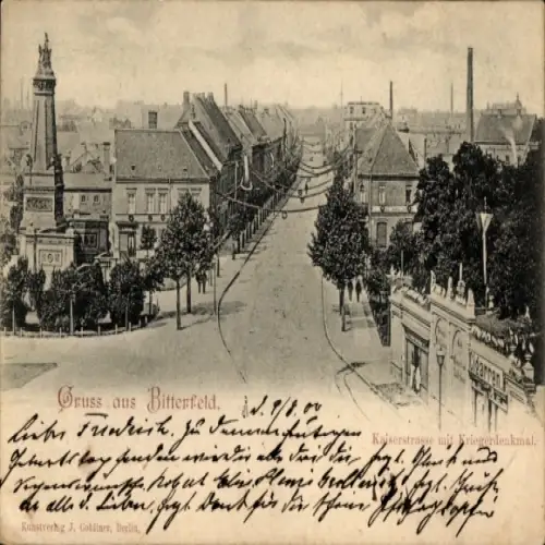 Ak Bitterfeld in Sachsen Anhalt, Kaiserstraße mit Kriegerdenkmal, Bäume, alte Häuser, 