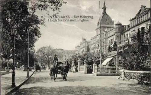 Ak Interlaken Kanton Bern Schweiz,  Der Höheweg, Hotels Victoria und Jungfrau, Pferdewagen