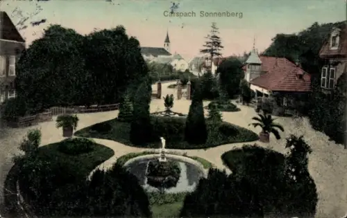 Ak Carspach Karspach Elsass Haut Rhin, Bad Sonnenberg, Ansicht von  Garten mit Brunnen und Bäumen