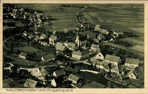 Ak Wolterdingen Soltau Lüneburger Heide, Luftaufnahme von  Häuser, Kirche, Landschaft
