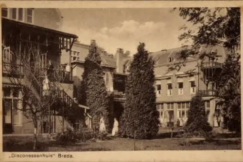 Ak Breda Nordbrabant Niederlande, Diakonessenhuis, zwei Gebäude, Personen im Garten
