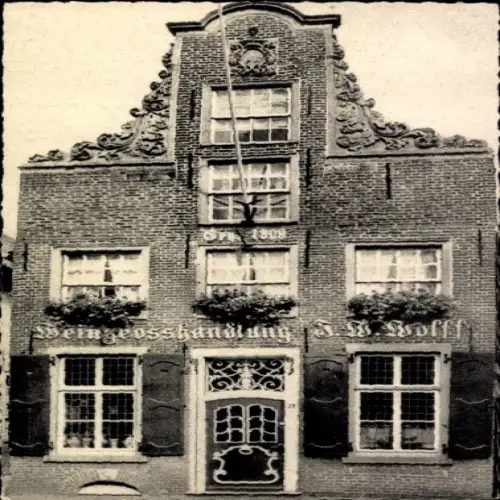 Ak Leer in Niedersachsen, Ältestes Haus, Weingroßhandlung J.W. Wolff