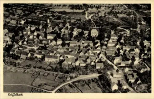 Ak Kröffelbach Waldsolms im Taunus Hessen, Luftaufnahme von  viele Häuser und Grünflächen