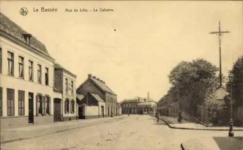 Ak La Bassée Nord,  Rue de Lille, Le Calvaire, Straßenansicht, keine Personen