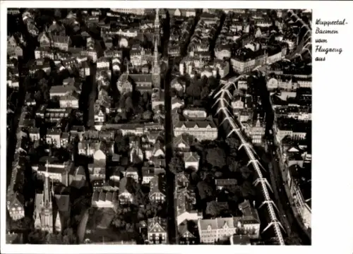 Ak Wuppertal, Luftaufnahme von  Stadtansicht, Banner mit Text