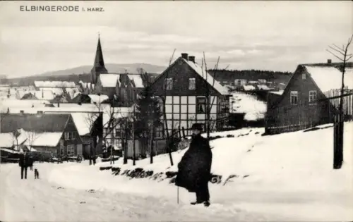Ak Elbingerode Oberharz am Brocken, Ortschaft im Winter, Straßenpartie, Spaziergänger