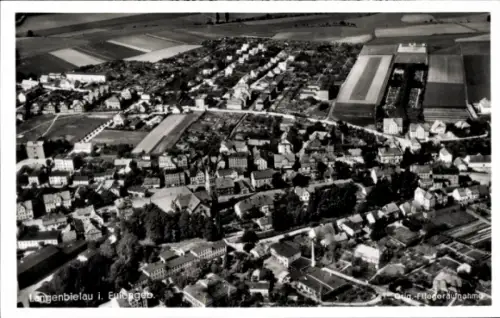 Ak Bielawa Langenbielau Schlesien, Luftaufnahme von   Gebäude, grünes Umland